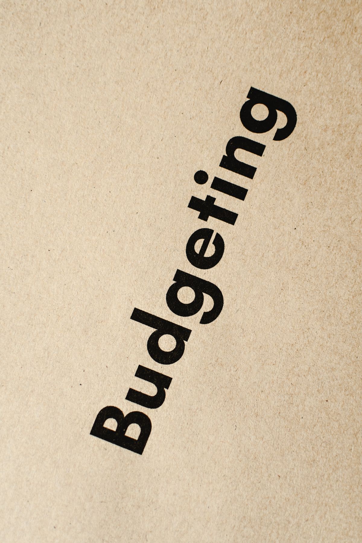 Budget planning notebook representing the 50/30/20 budgeting rule