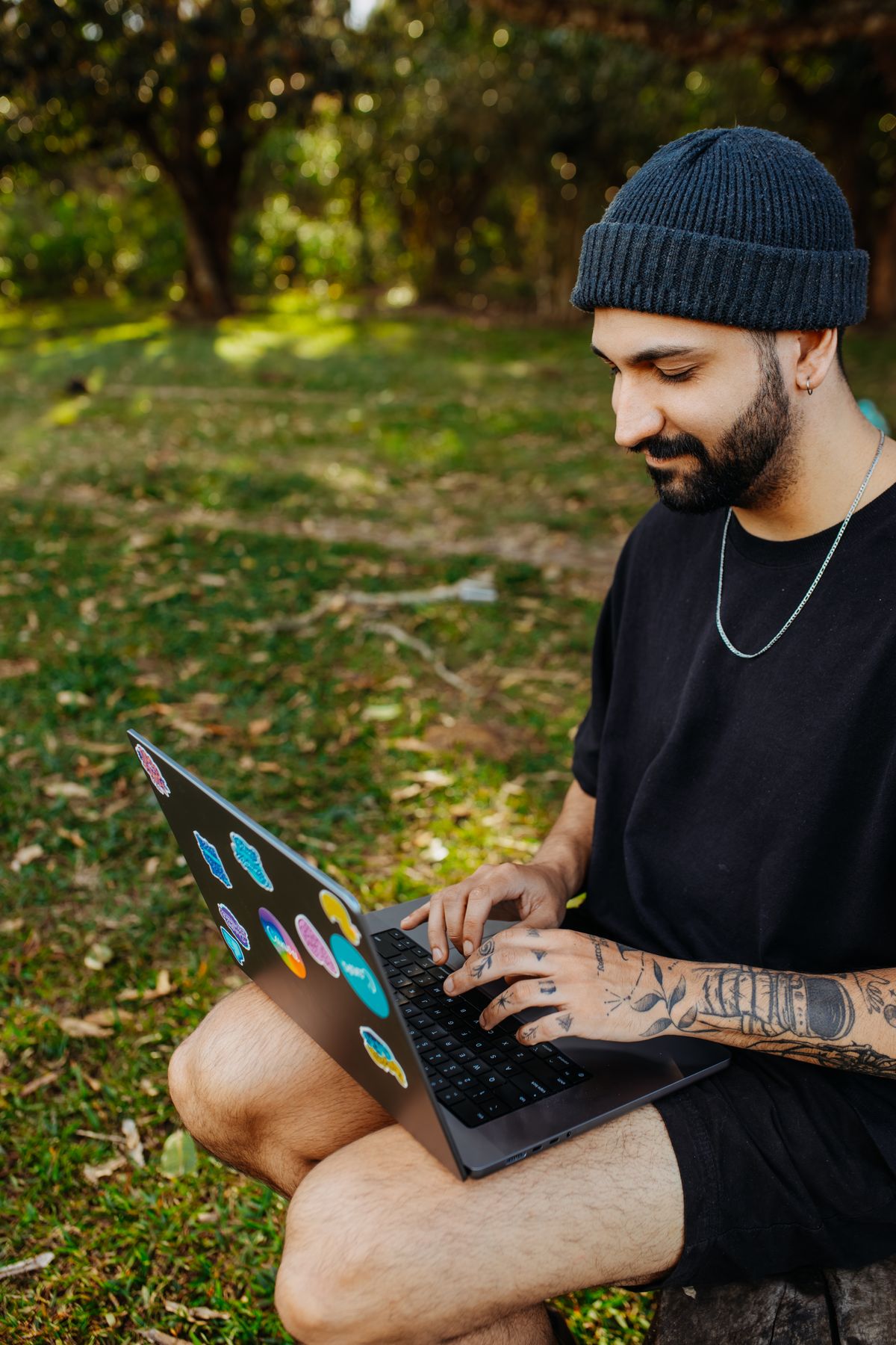 Freelancer reviewing invoices and income while setting aside money for taxes