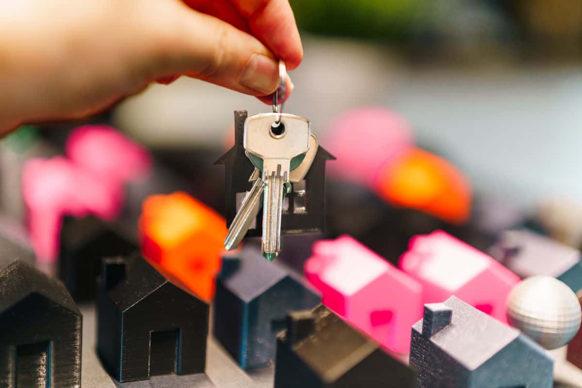 Family moving into a new home after calculating how much house they can actually afford